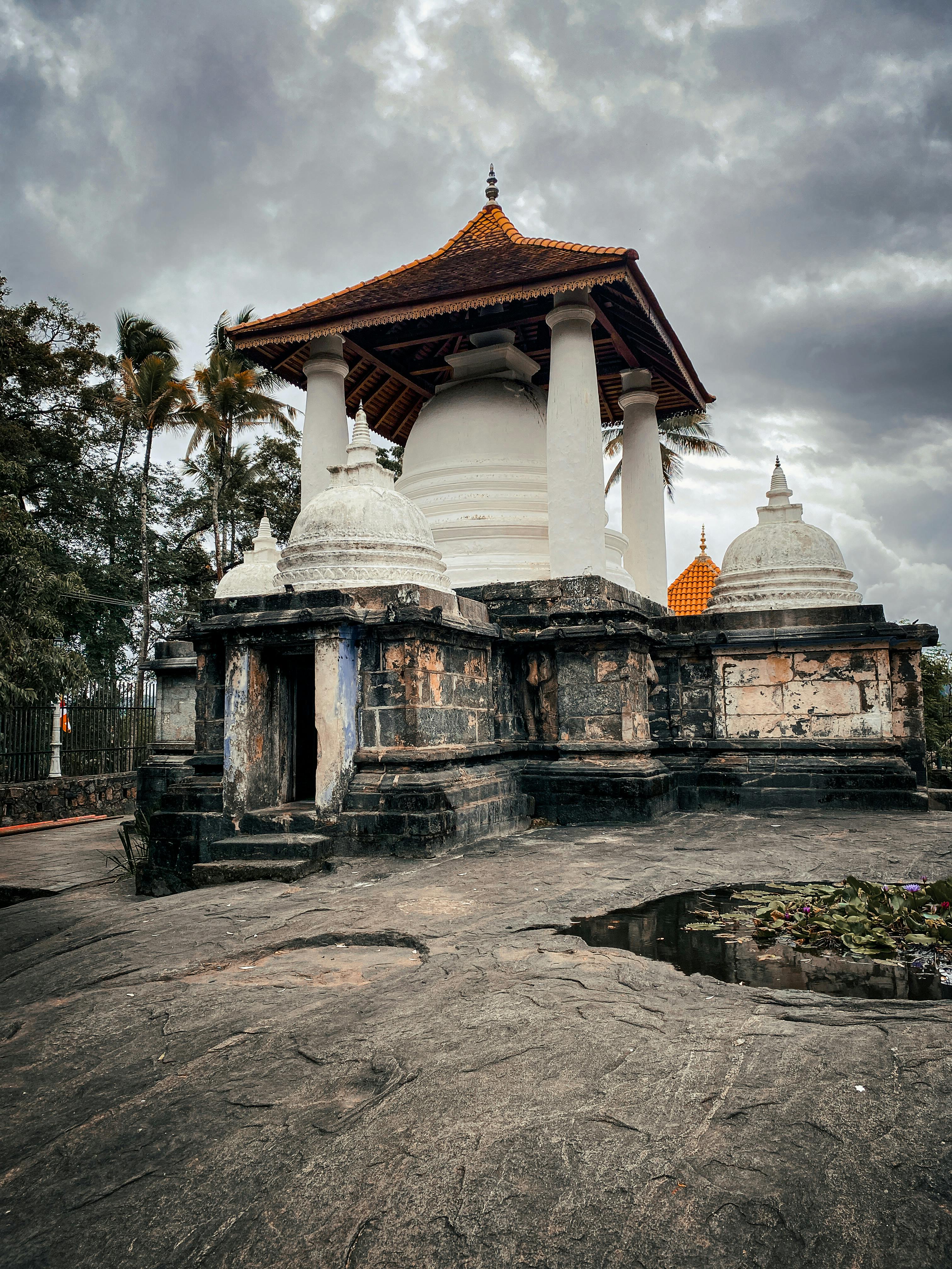 Gadaladeniya Temple under a moody sky